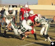 Making the tackle. Photo by Dawn Ballou, Pinedale Online.