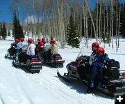 Go on a snowmobile trip!. Photo by Green River Outfitters.