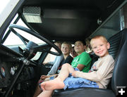 Kids in the cab. Photo by Dawn Ballou, Pinedale Online.