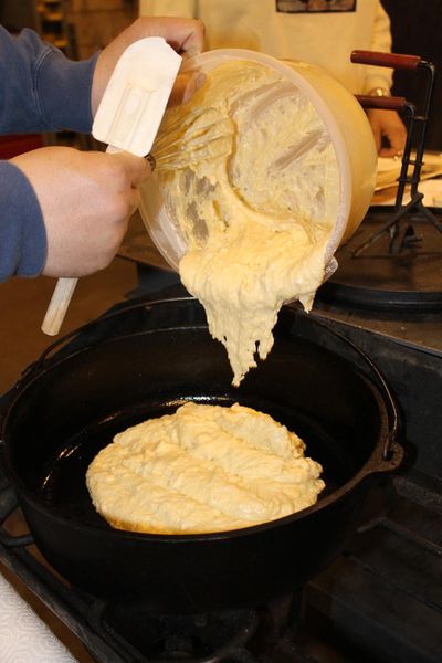 Pouring batter. Photo by Dawn Ballou, Pinedale Online.