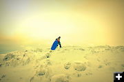 Boy on a Sled Hill. Photo by Terry Allen.