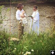Baptism on Pine Creek. Photo by Kay Morris.