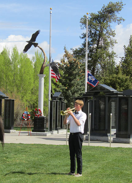 Taps played by Brycen Vrska. Photo by Dawn Ballou, Pinedale Online.