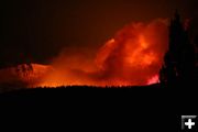 Orange fire glow. Photo by Clint Gilchrist, Pinedale Online.