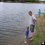Fishing with Dad. Photo by Dawn Ballou, Pinedale Online.
