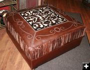 Leather foot stool. Photo by Dawn Ballou, Pinedale Online.
