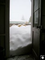 Snow up to the door. Photo by Dawn Ballou-Svalberg, Pinedale Online.