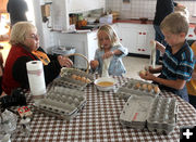 Helping with the eggs. Photo by Pinedale Online.