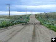 Overtopped road. Photo by Dawn Ballou, Pinedale Online.