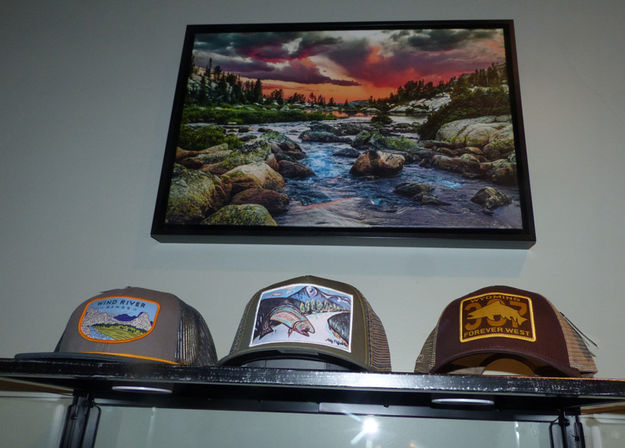 Hats and art. Photo by Pinedale Online.