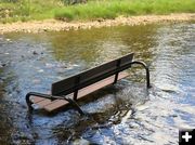 Bench in creek. Photo by Sublette County Rec Board.